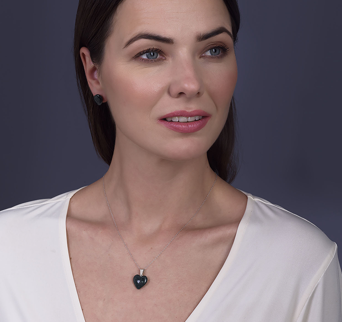 woman wearing handcrafted jade jewelry